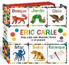 UNA CAJA CON MUCHOS LIBROS Y UN PUZZLE